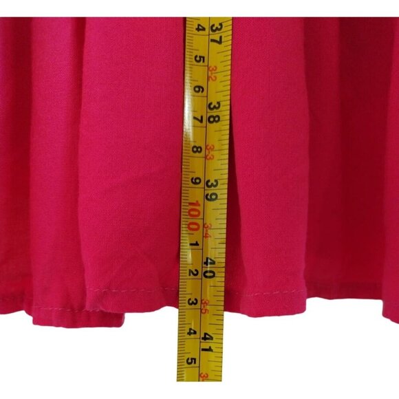 Pink sleeveless halterneck dress with ruffle hem and bow at back, viscose. - Picture 6 of 7